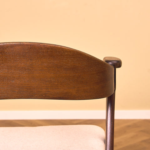 Danish dining chairs in stained teak by Kai Kristiansen