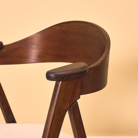 Danish dining chairs in stained teak by Kai Kristiansen