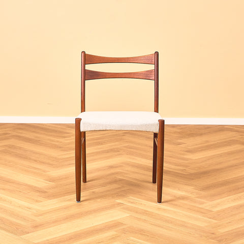 Danish dining chairs in teak in the style of Ejner Larsen