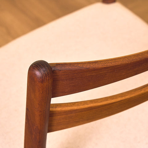Danish dining chairs in teak in the style of Ejner Larsen