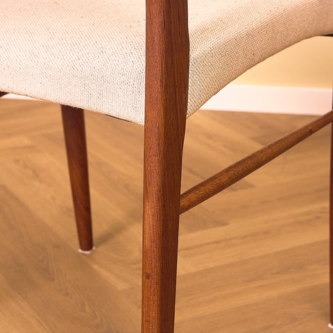 Danish dining chairs in teak in the style of Ejner Larsen