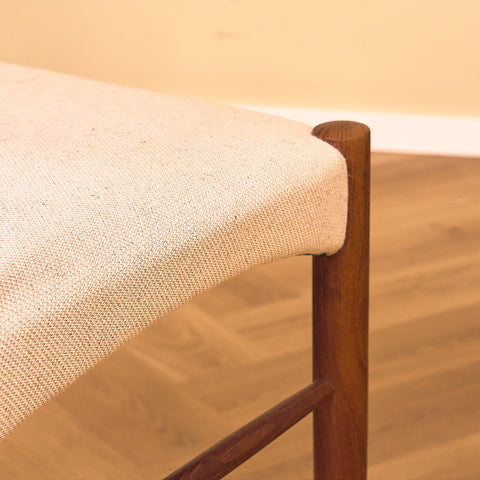Danish dining chairs in teak in the style of Ejner Larsen