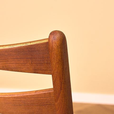 Danish dining chairs in teak in the style of Ejner Larsen