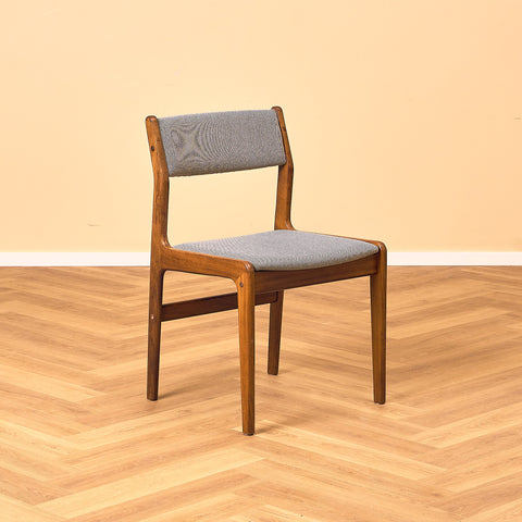 Danish dining chairs in walnut by Farstrup