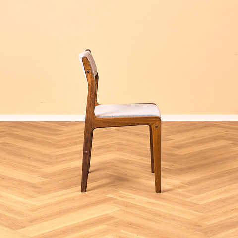 Danish dining chairs in walnut by Farstrup