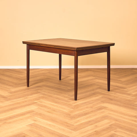 Danish rectangular dining table in teak and walnut