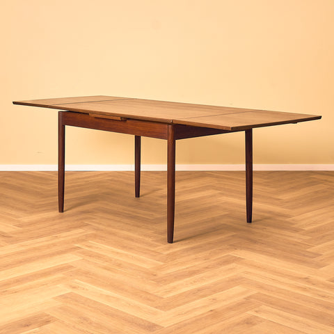 Danish rectangular dining table in teak and walnut