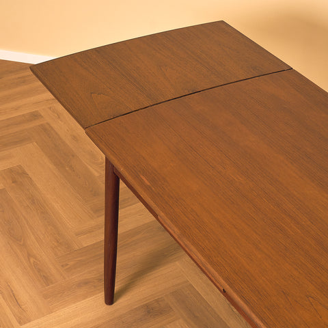 Danish rectangular dining table in teak and walnut