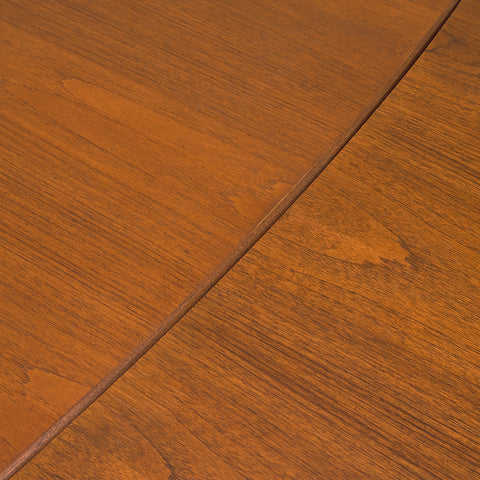 Danish rectangular dining table in teak and walnut
