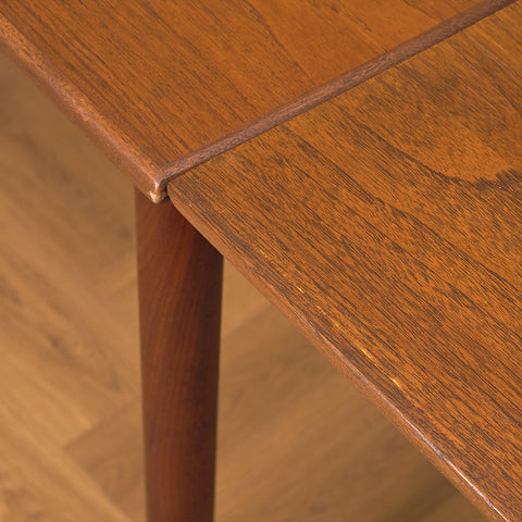 Danish rectangular dining table in teak and walnut