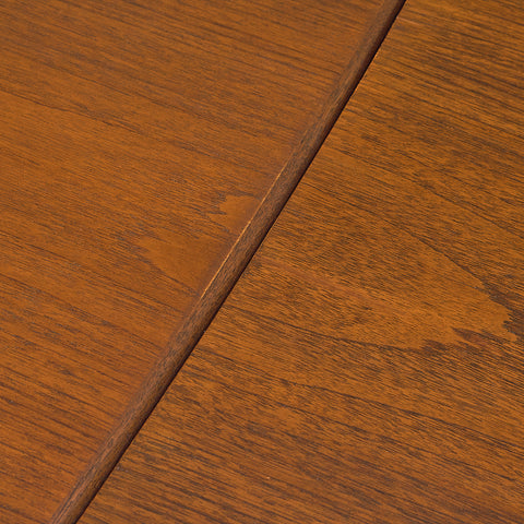 Danish rectangular dining table in teak and walnut