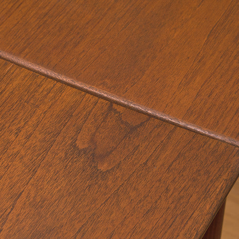 Danish rectangular dining table in teak and walnut