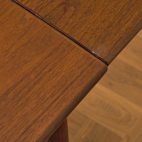 Danish rectangular dining table in teak and walnut