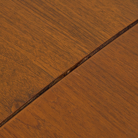 Danish rectangular dining table in teak and walnut