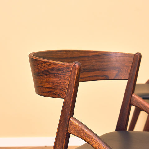 Danish dining chairs in teak and Santos rosewood by Dyrlund