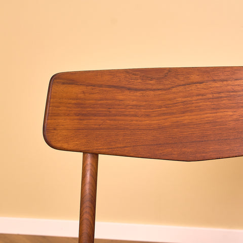 Danish dining chairs in teak and walnut