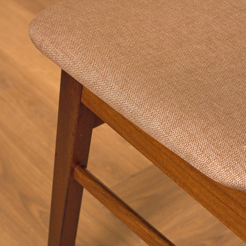 Danish dining chairs in teak and walnut