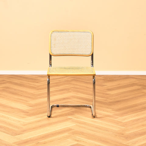 Italienskt set med 4 matstolar i bok från Marcel Breuer