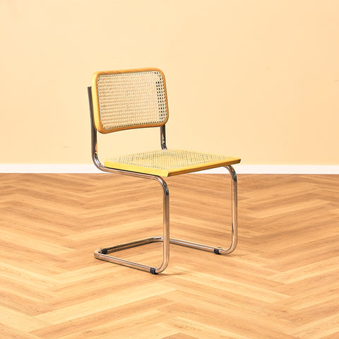 Italienskt set med 4 matstolar i bok från Marcel Breuer
