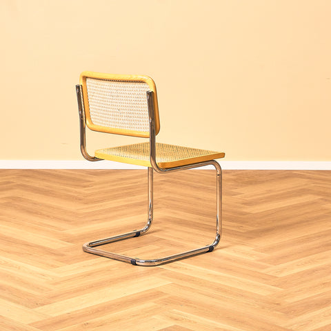 Italienskt set med 4 matstolar i bok från Marcel Breuer