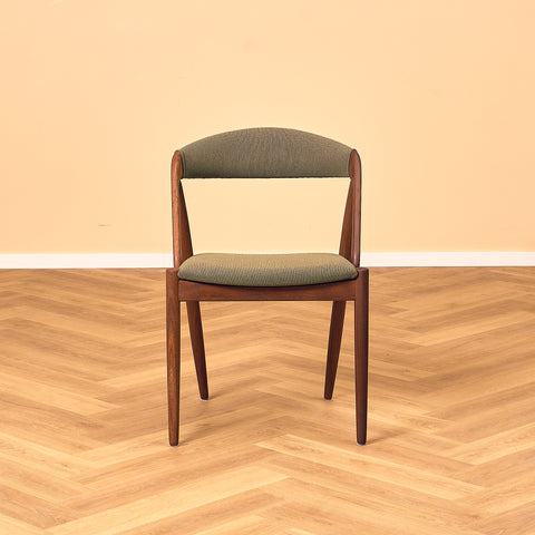 Danish dining chairs in walnut, model 31 by Kai Kristiansen