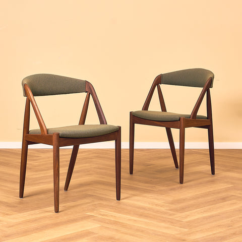 Danish dining chairs in walnut, model 31 by Kai Kristiansen