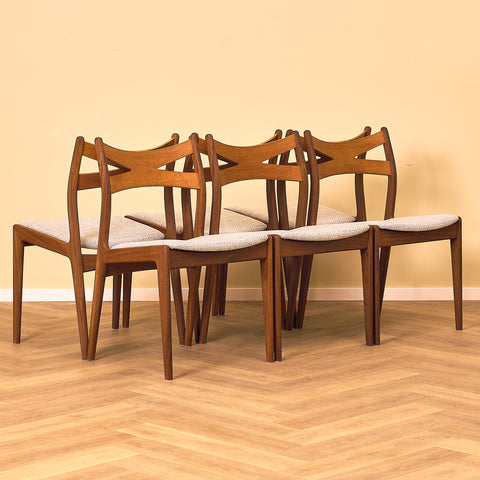 Danish dining chairs in teak and walnut