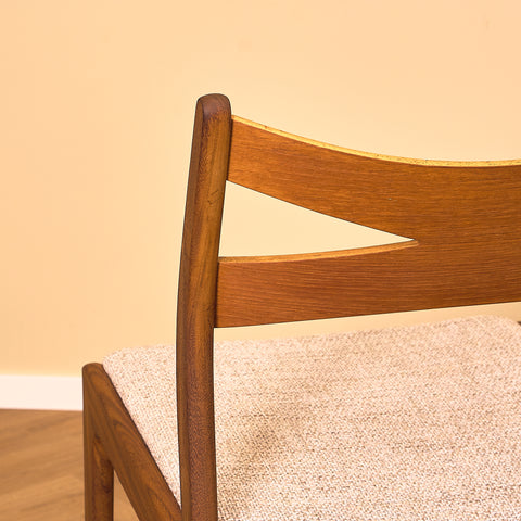 Danish dining chairs in teak and walnut