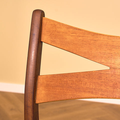 Danish dining chairs in teak and walnut