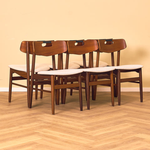 Danish dining chairs in teak and walnut