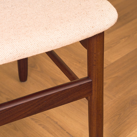 Danish dining chairs in teak and walnut
