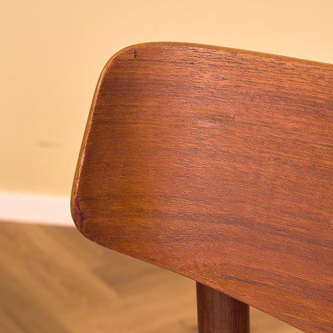 Danish dining chairs in teak and walnut