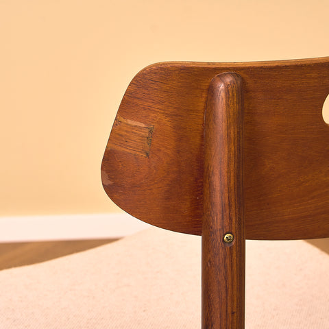 Danish dining chairs in teak and walnut