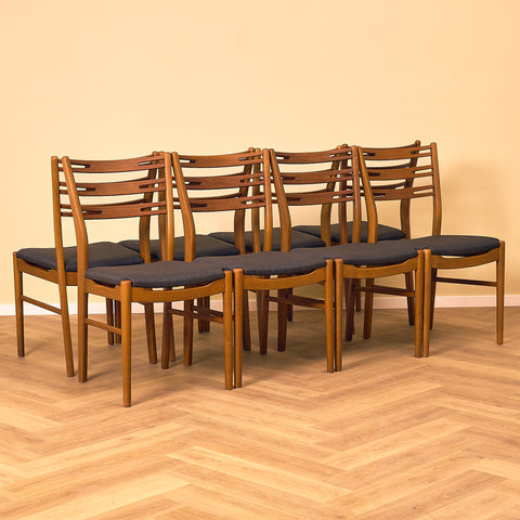 Danish set of 8 dining chairs "model 219" in teak & beech by Farstrup