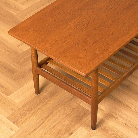 Danish coffee table in teak and oak by Ejvind A. Johansson for FDB