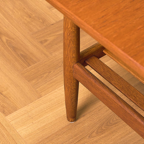 Danish coffee table in teak and oak by Ejvind A. Johansson for FDB