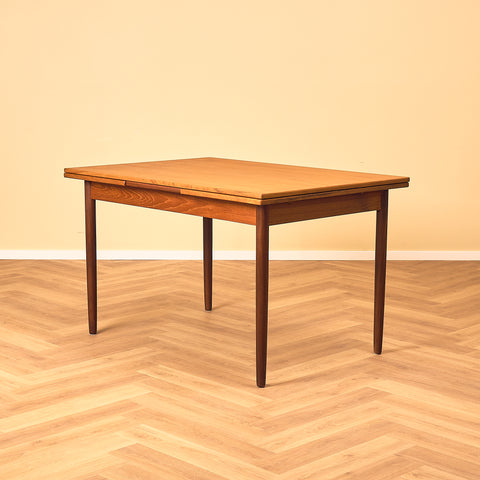 Danish dining table in teak and walnut