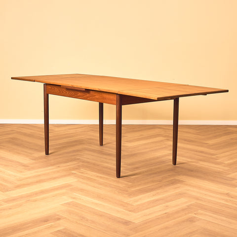 Danish dining table in teak and walnut