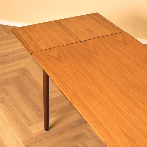 Danish dining table in teak and walnut