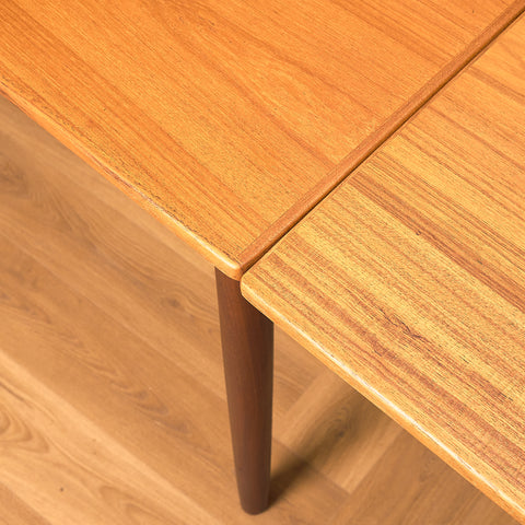 Danish dining table in teak and walnut