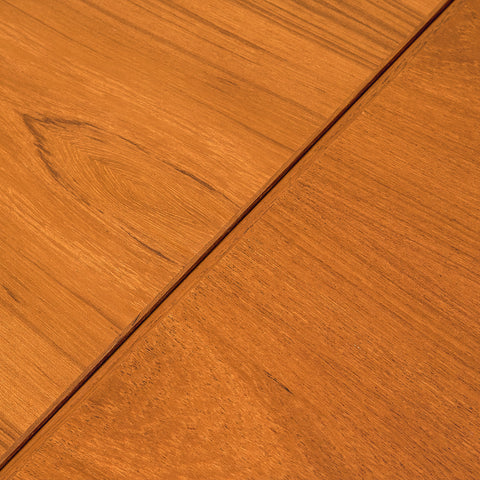 Danish dining table in teak and walnut