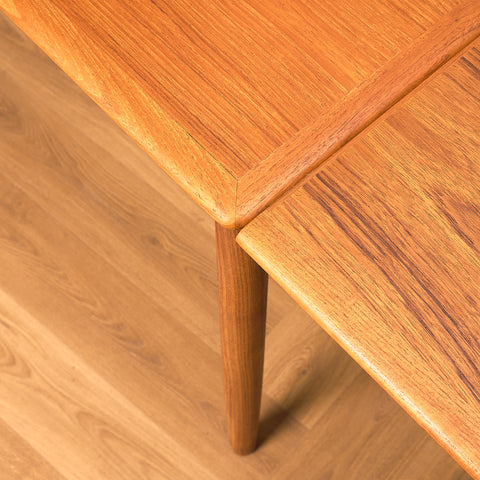 Danish dining table in teak and walnut