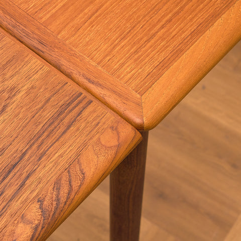 Danish dining table in teak and walnut