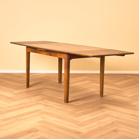 Mid-century dining table in oak and walnut