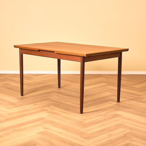 Danish dining table in teak and walnut