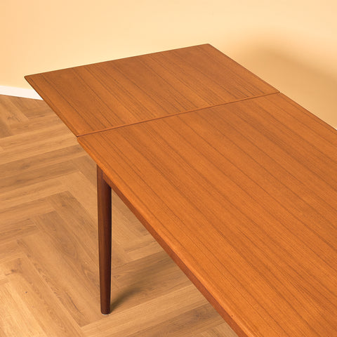 Danish dining table in teak and walnut