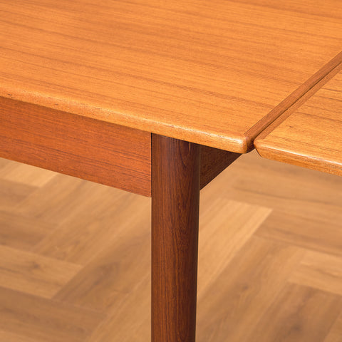 Danish dining table in teak and walnut