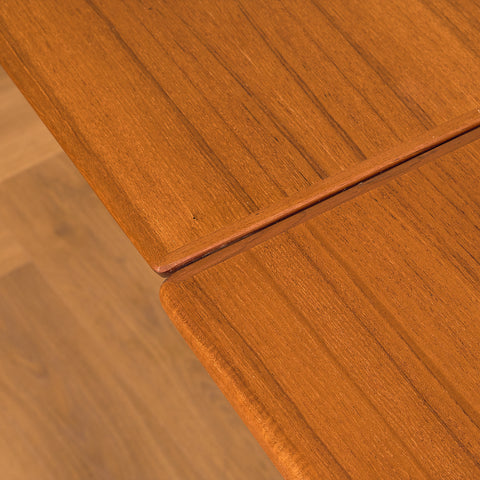 Danish dining table in teak and walnut