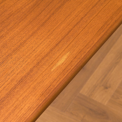 Danish dining table in teak and walnut