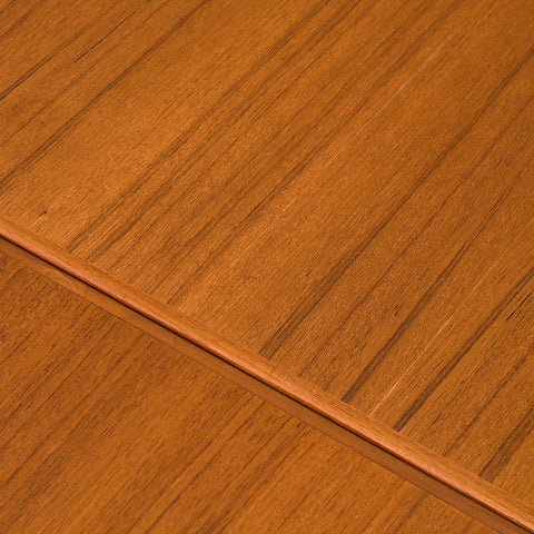 Danish dining table in teak and walnut